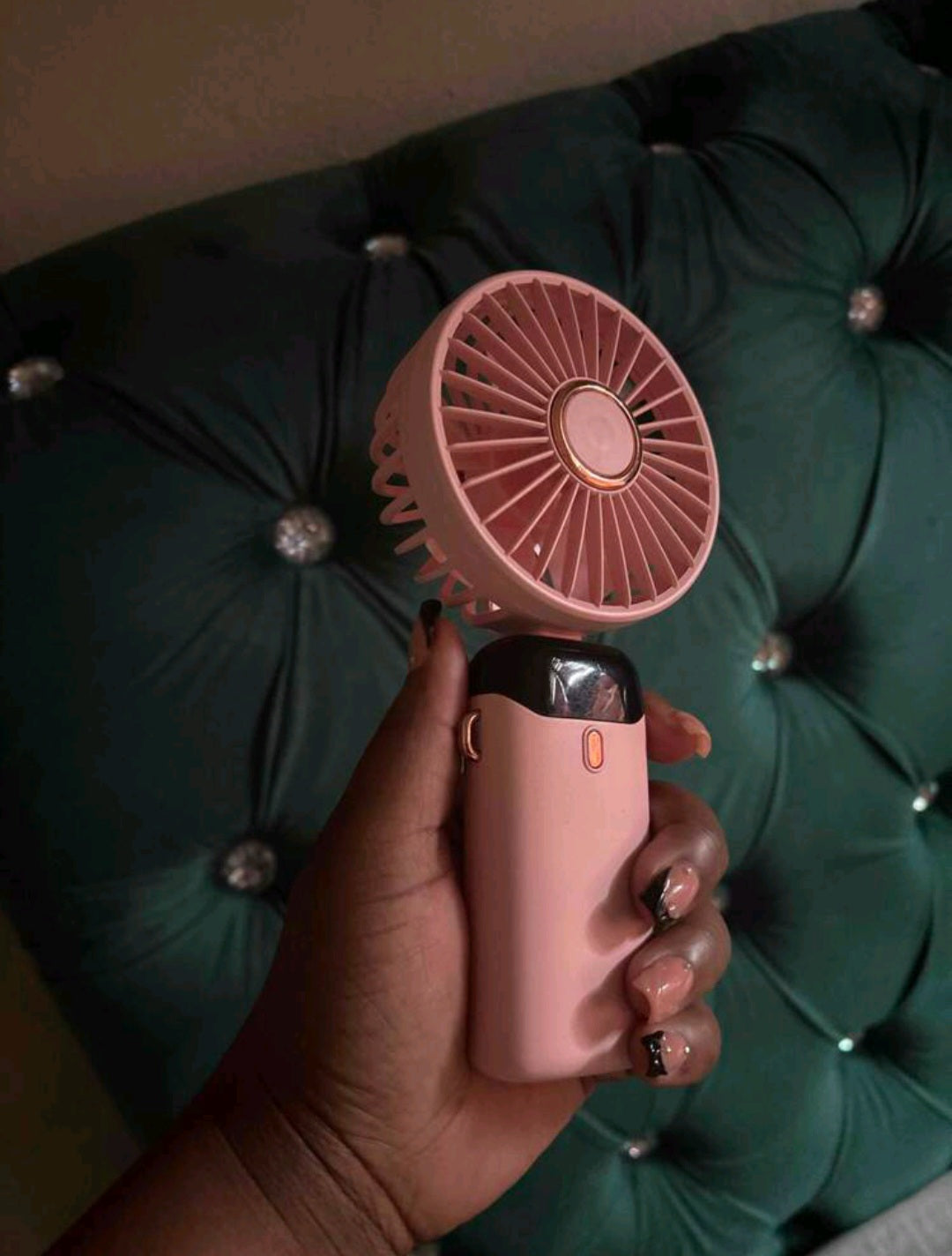Automatic handheld fan